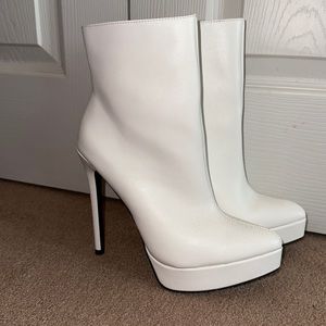 White high-heeled ankle boots